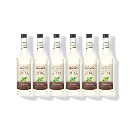 Six 750ml glass bottles of Monin Natural Zero Sweetener in a row